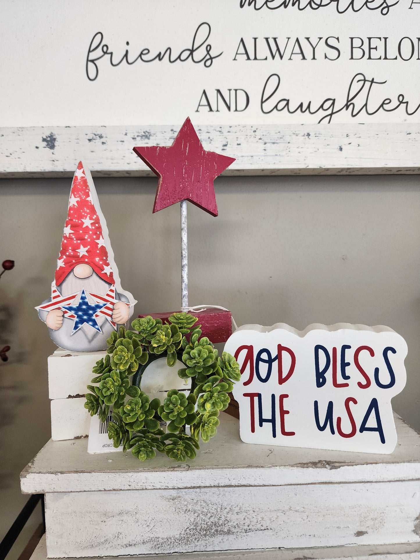 4th of July Wooden Gnome Cutout. This Small Guy is great for tier trays, rae dunn setups, 4th of July shelves, or mantels. Cute to add to a tray or table centerpiece. This guy is wooden and painted red white and blue so it matches the classic Fourth of July color set.  collectable gnome 