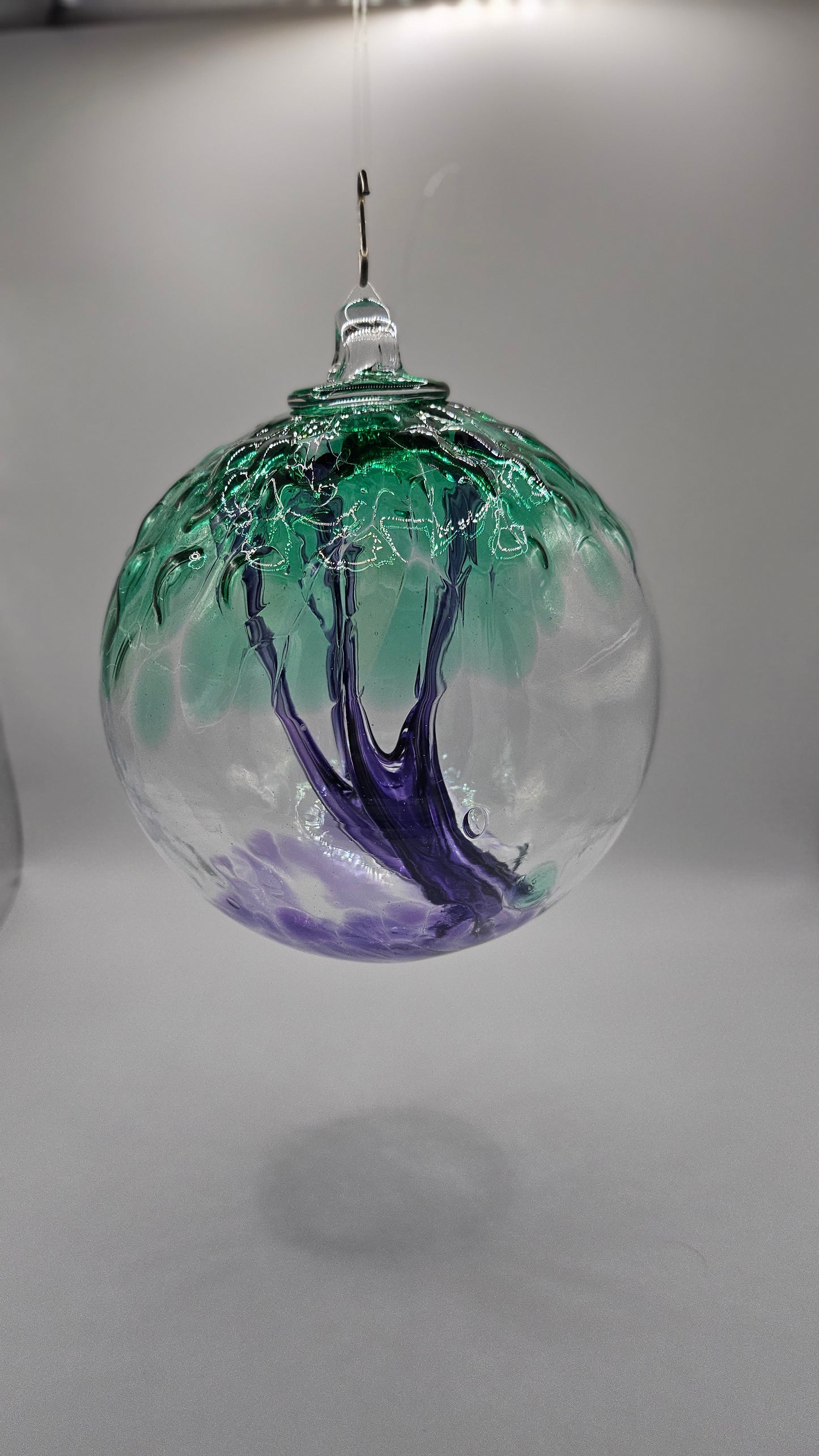 Glass orb, witch ball, spirit ball, evil spirit ball, green and purple glass kuleg kitras art, iron art blown glass