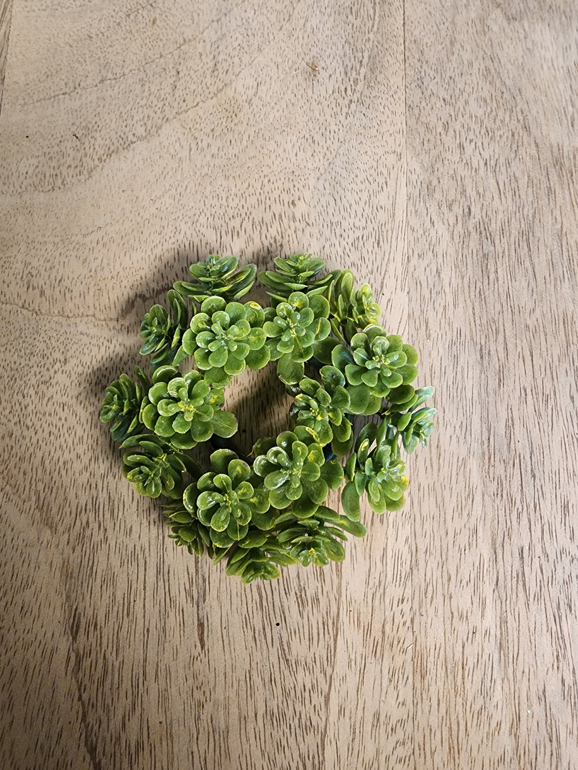 3" Mini Stonecrop Candle RingIntricate rosette-like succulents give a wonderful sense of texture and a great pop of color to displays year-round. 3? | 1.5 inner. materials: plastic, plastic base. *featured w/ 3? Alette Candle Holder, HM 5233 sold separate