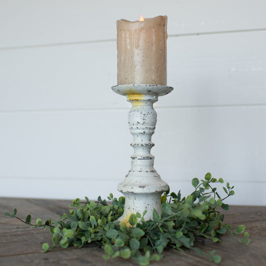 White Candle stick, great accent for any home. Add this to a mantel, shelf or dinning table to add that vintage look. W: 4" H: 8.75" Candle stick is 8.75" tall *this listing is for 1 candle stick only all other decor and candles are not included8.75" Aged