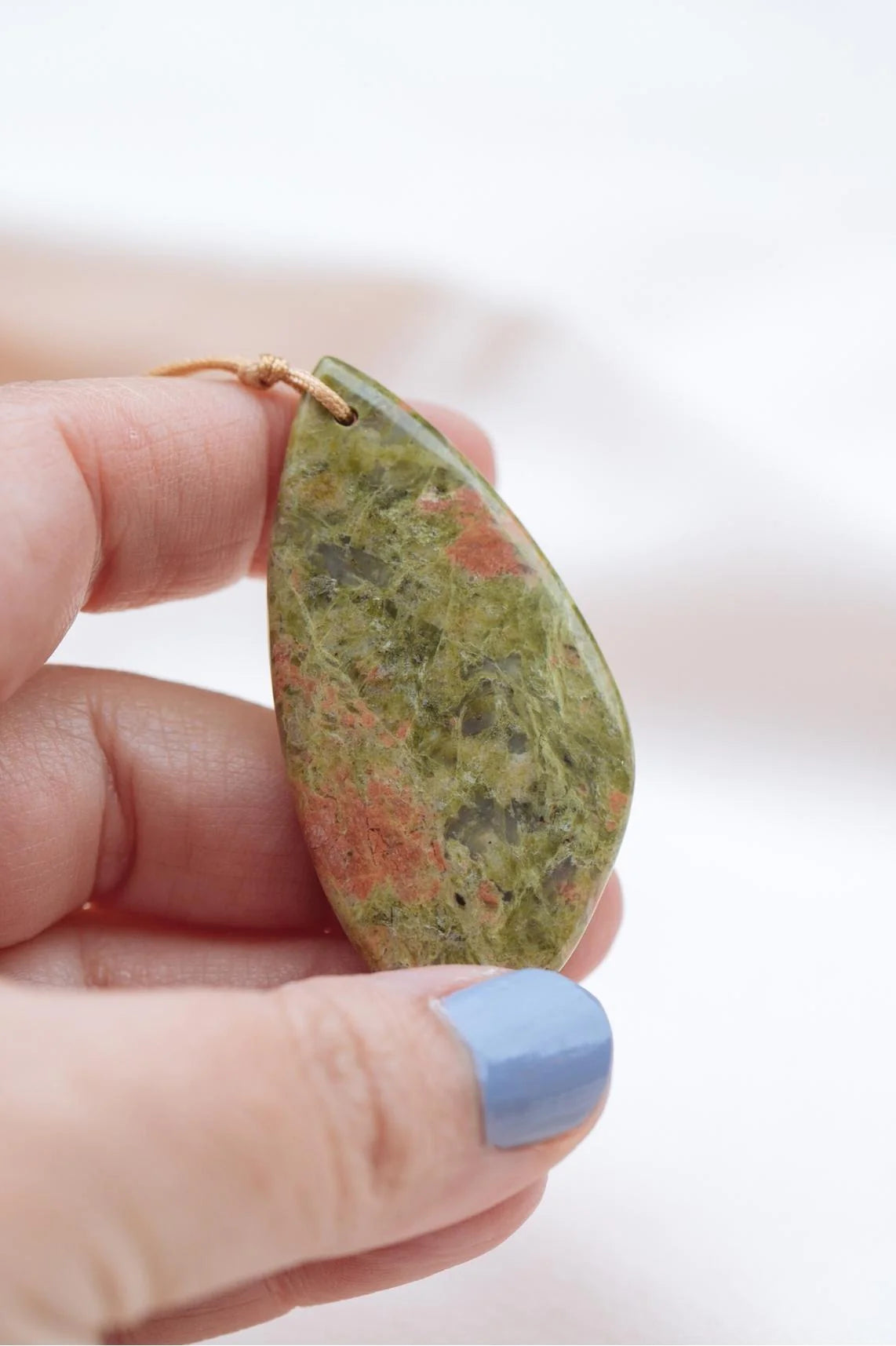 Balance Touch Stone - Unakite StoneOur beautiful, smooth, soothing Touchstones were intentionally designed as a tangible reminder of your truths. These sweet stones warm with your body's heat, exude healing energies, and can literally be grasped onto like